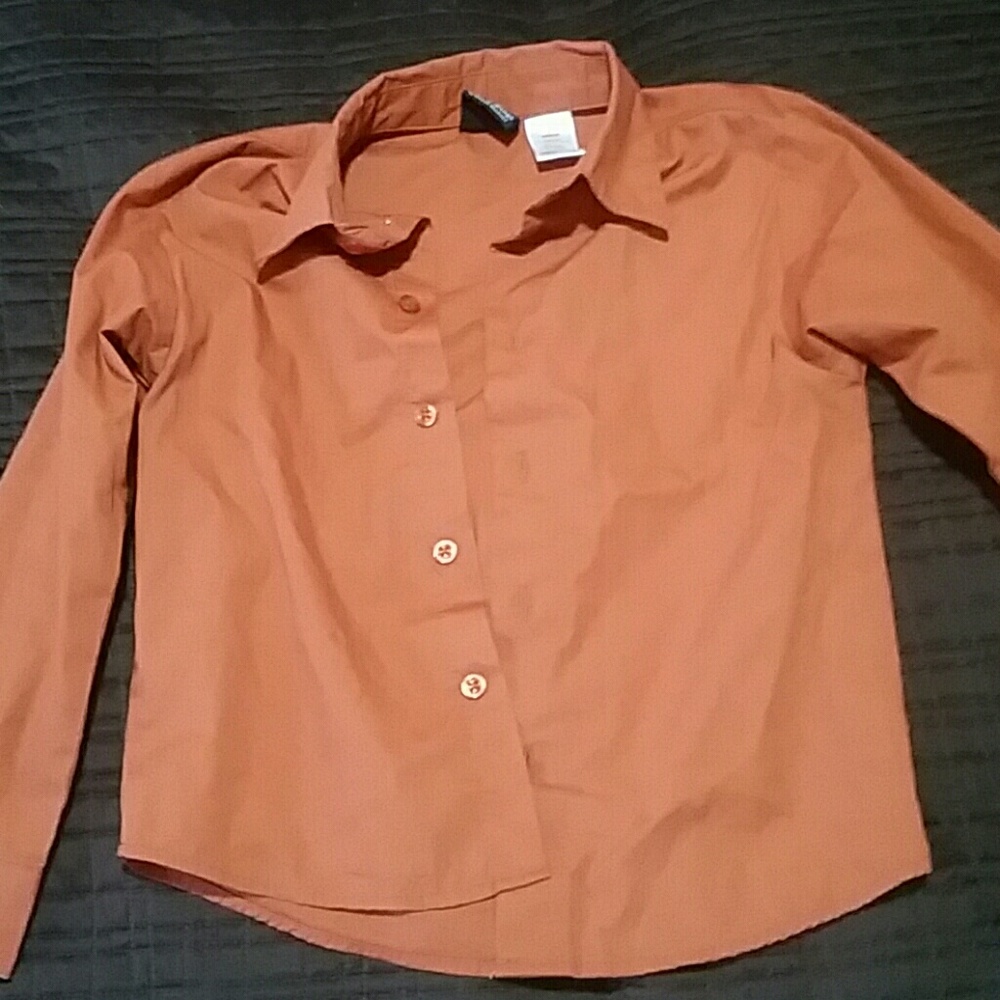 Awesome boys burnt orange butten up shirt.